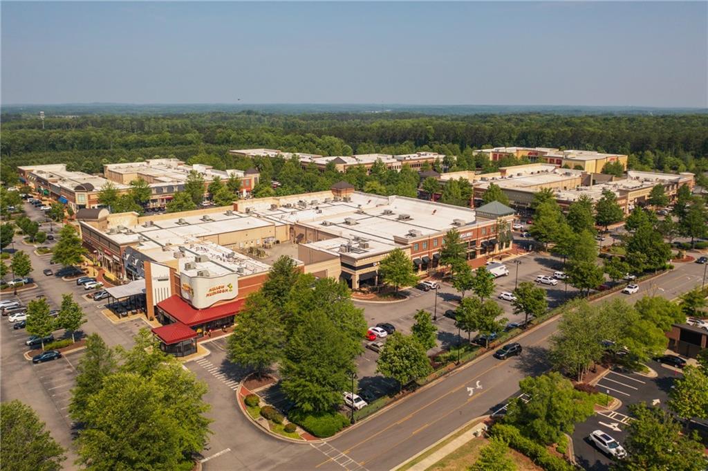 502 Alice Way, Unit D21 Cumming, GA 30040 - Photo 44 of 52 an aerial view of residential building and lake