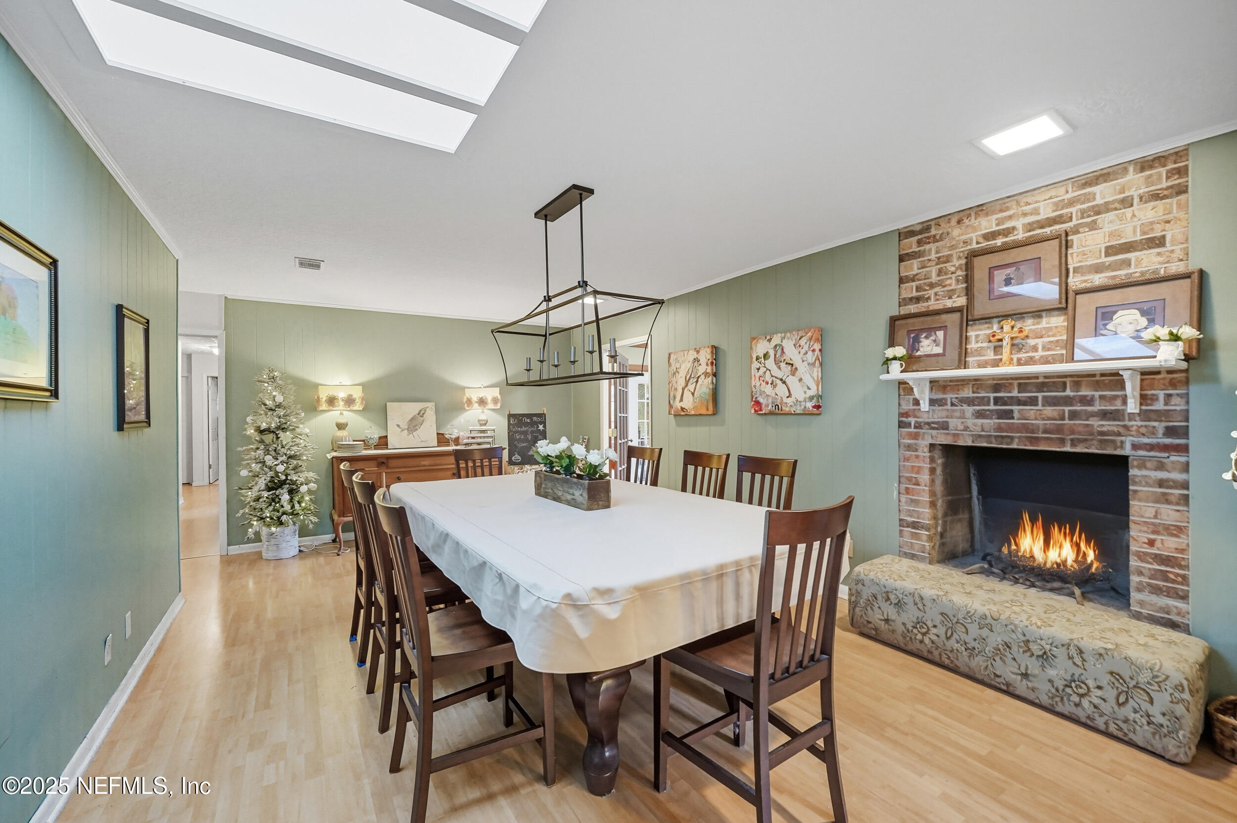 5396 Golf Course Drive Jacksonville, FL 32277 - Photo 1 of 62 a view of a dining room with furniture window and wooden floor