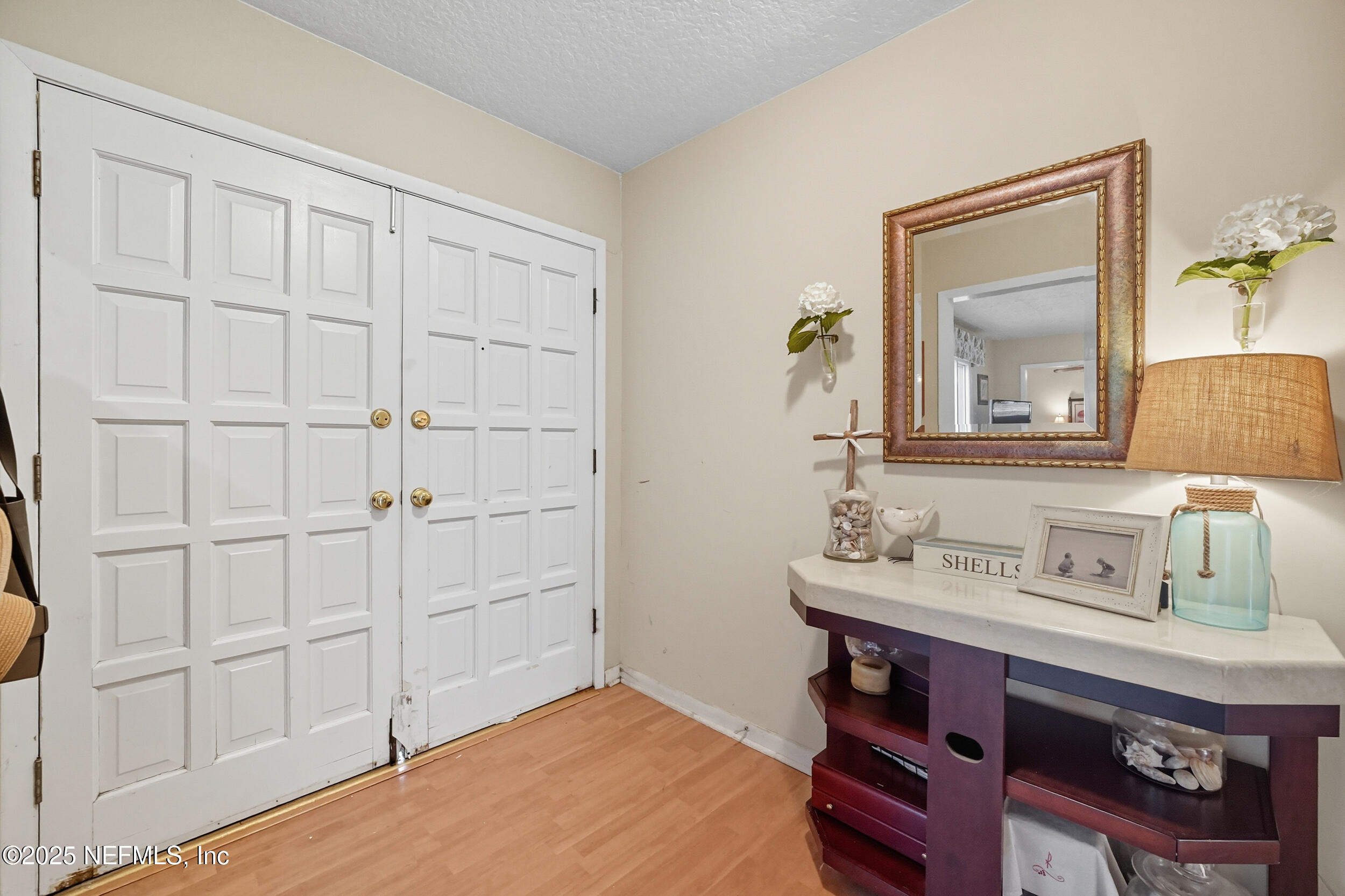 5396 Golf Course Drive Jacksonville, FL 32277 - Photo 15 of 62 a bathroom with a sink and a mirror