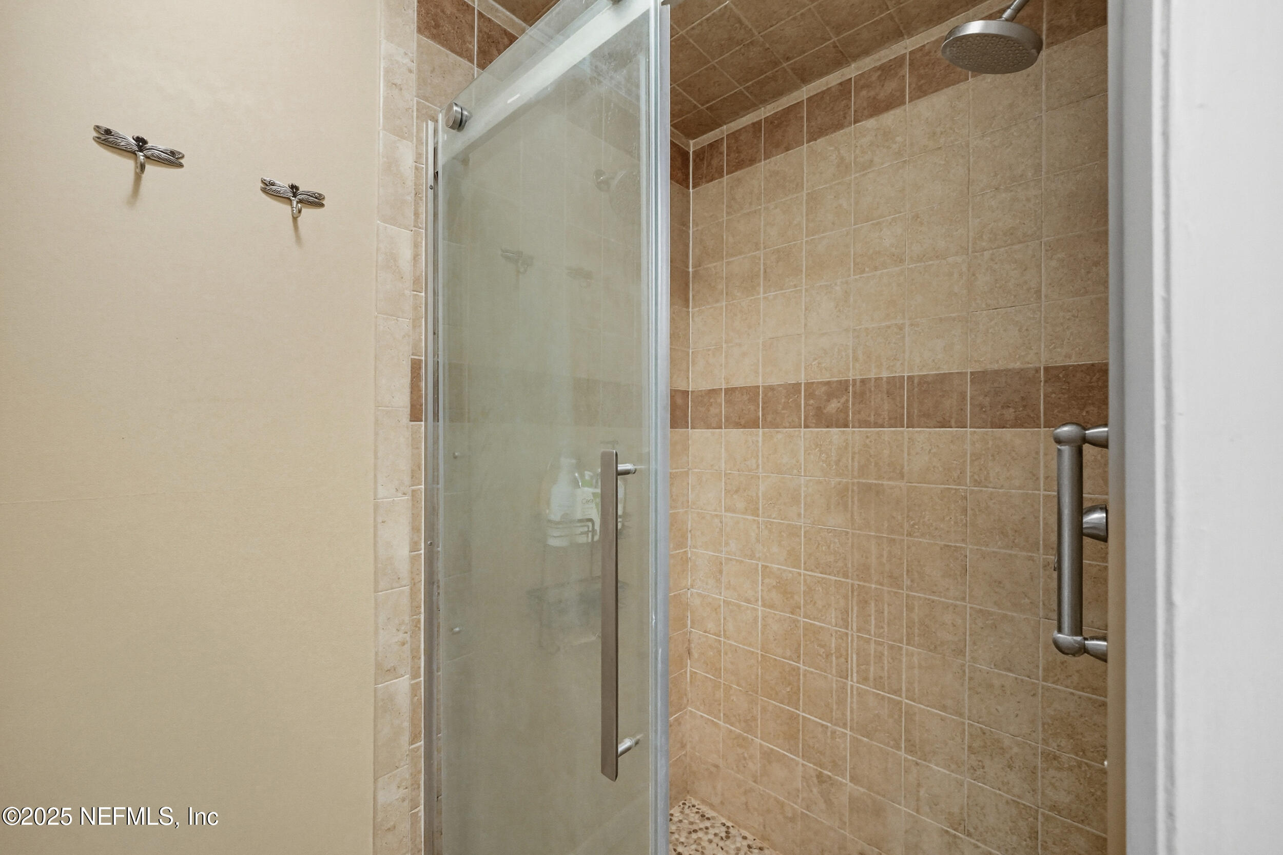 5396 Golf Course Drive Jacksonville, FL 32277 - Photo 32 of 62 a bathroom with a shower