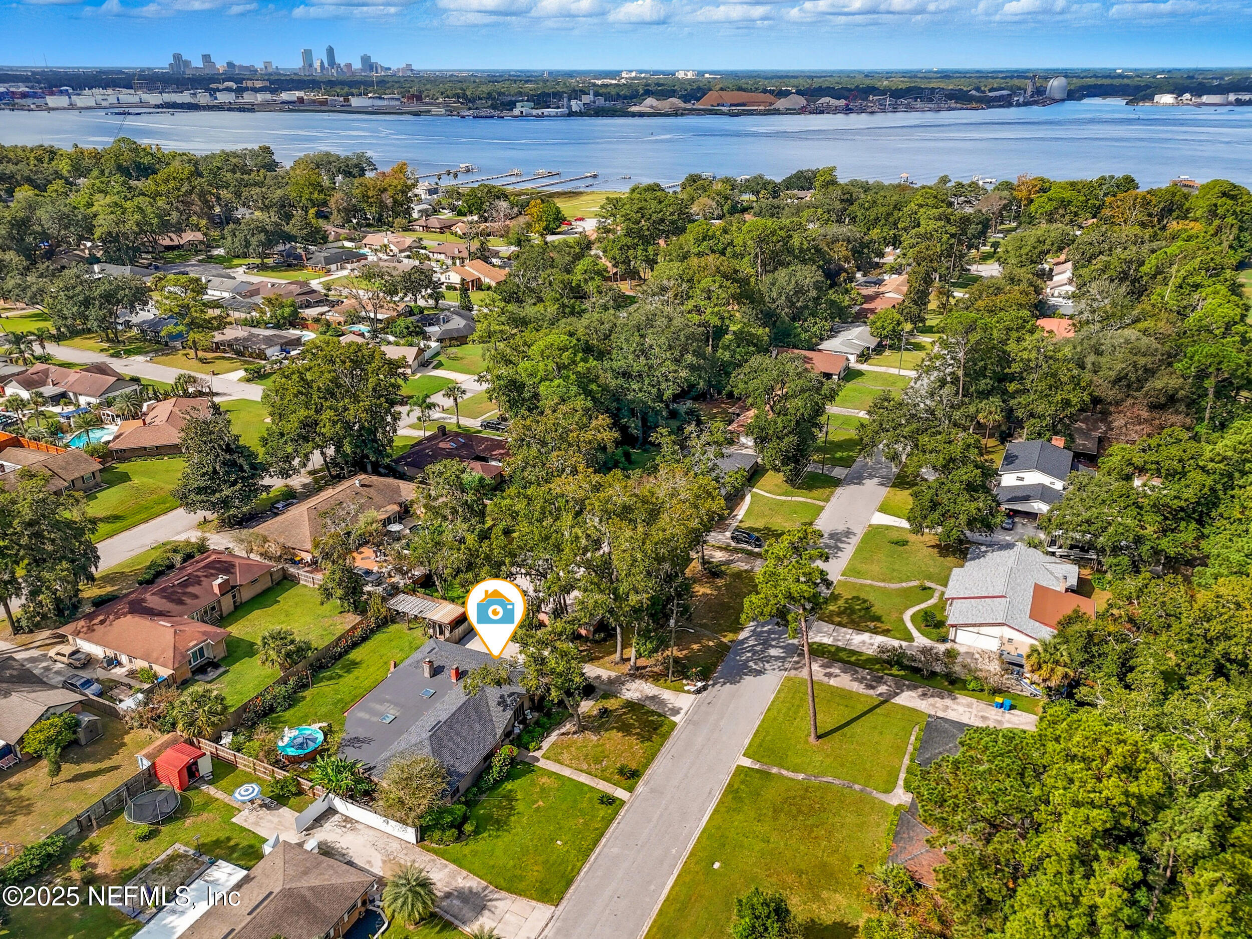 5396 Golf Course Drive Jacksonville, FL 32277 - Photo 47 of 62 an aerial view of residential building and lake