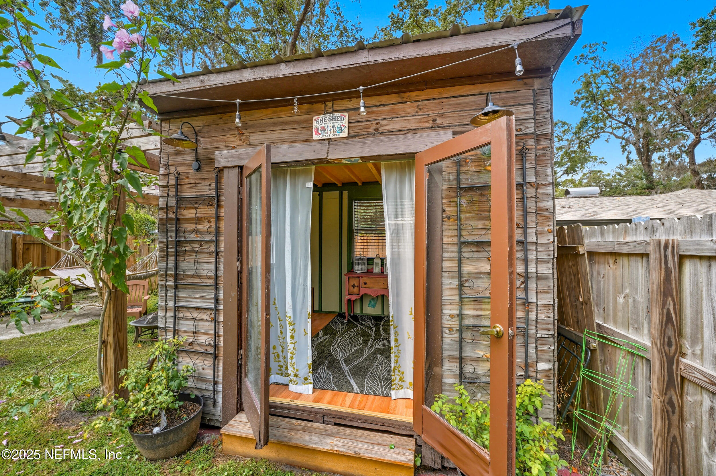 5396 Golf Course Drive Jacksonville, FL 32277 - Photo 10 of 62 a view of a entryway door of the house