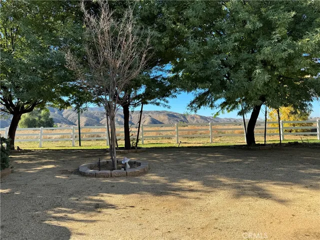 a view of a swimming pool with an outdoor space