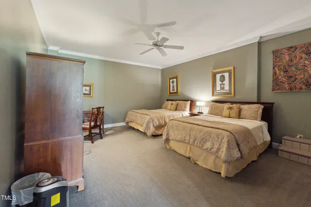 a view of a livingroom with furniture and a gym