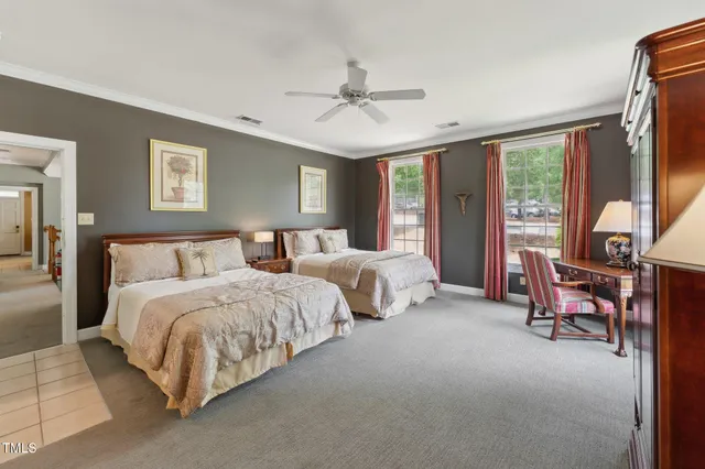 a bathroom with 2 sink tub and a mirror
