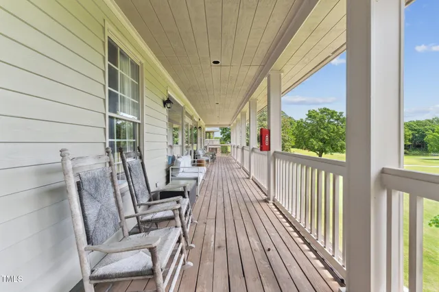 a spacious bedroom with two beds and a large window