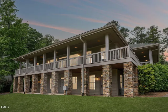 a view of balcony with furniture
