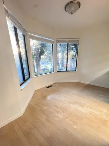 an empty room with windows