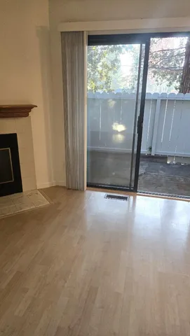 a view of a glass door with a sink