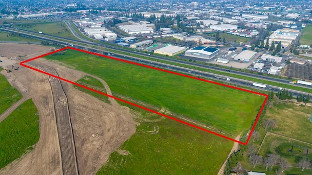 swimming pool with a yard and outdoor seating