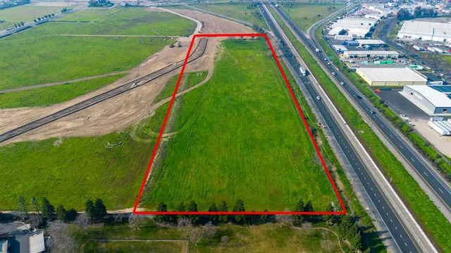 a view of a tennis ground with a large window