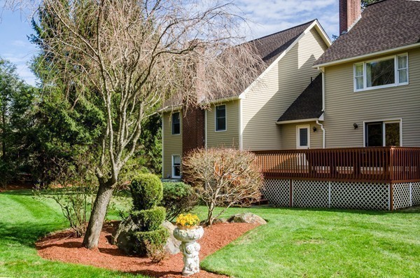 23 Solomon Pierce Road Lexington, MA 02420 - Photo 25 of 26 front view of a house with a yard