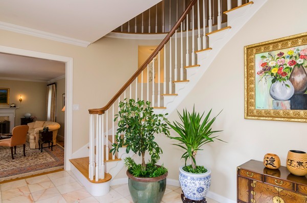 23 Solomon Pierce Road Lexington, MA 02420 - Photo 3 of 26 a view of entryway with paintings on the wall