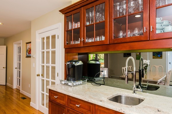 23 Solomon Pierce Road Lexington, MA 02420 - Photo 8 of 26 a bathroom with a sink and a mirror