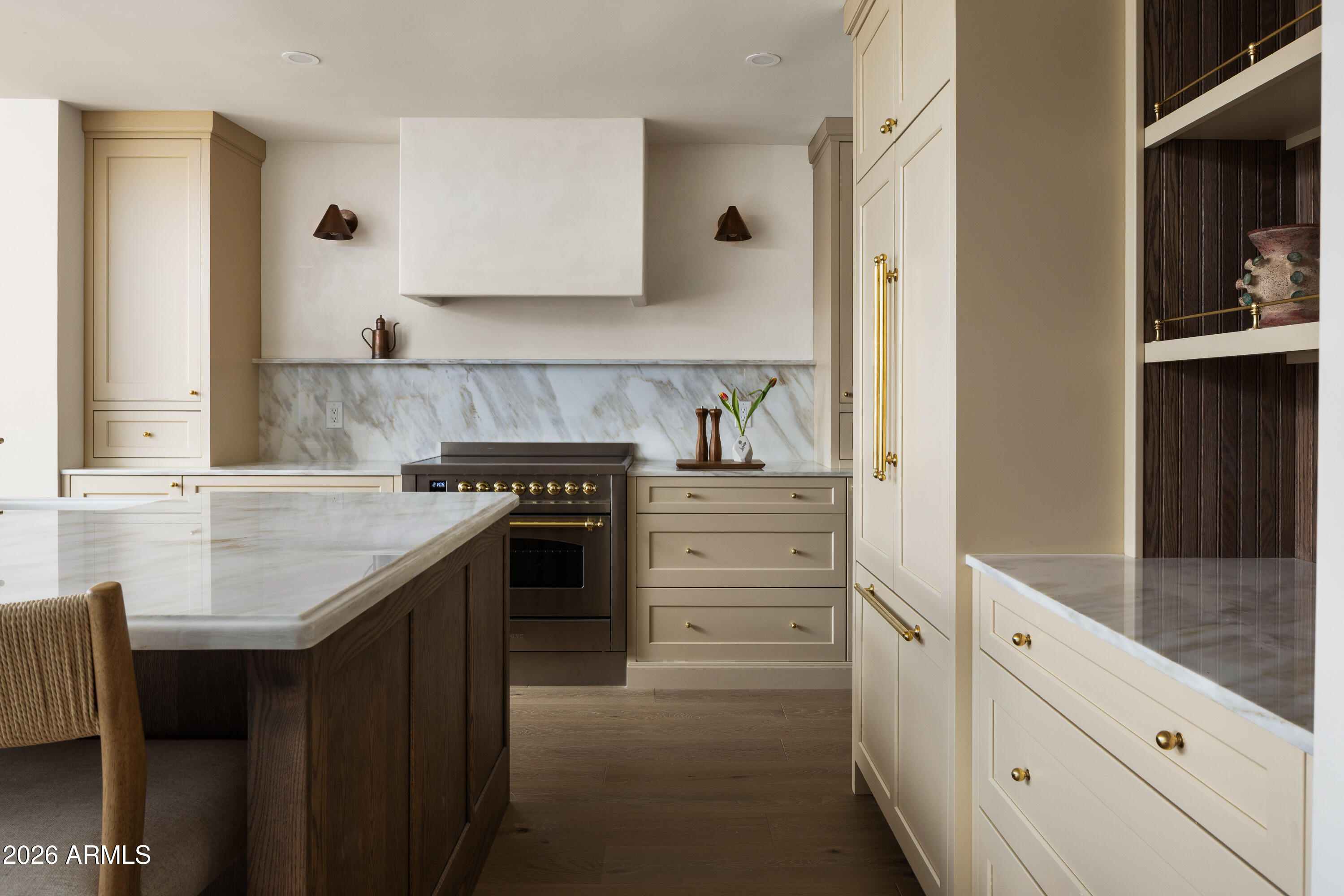 5501 East Camelback Road Phoenix, AZ 85018 - Photo 19 of 60 a kitchen with granite countertop a sink and cabinets