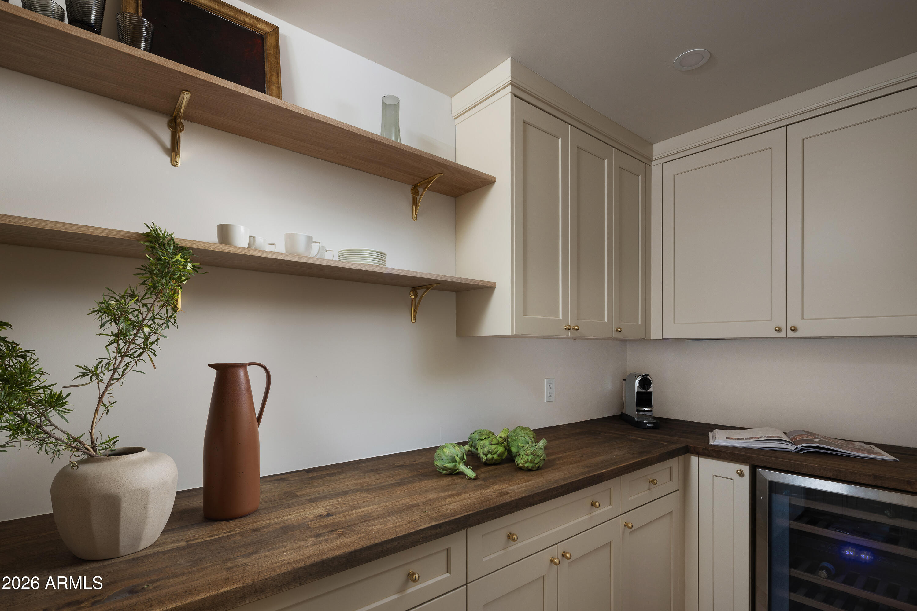 5501 East Camelback Road Phoenix, AZ 85018 - Photo 23 of 60 a kitchen with a sink and cabinets
