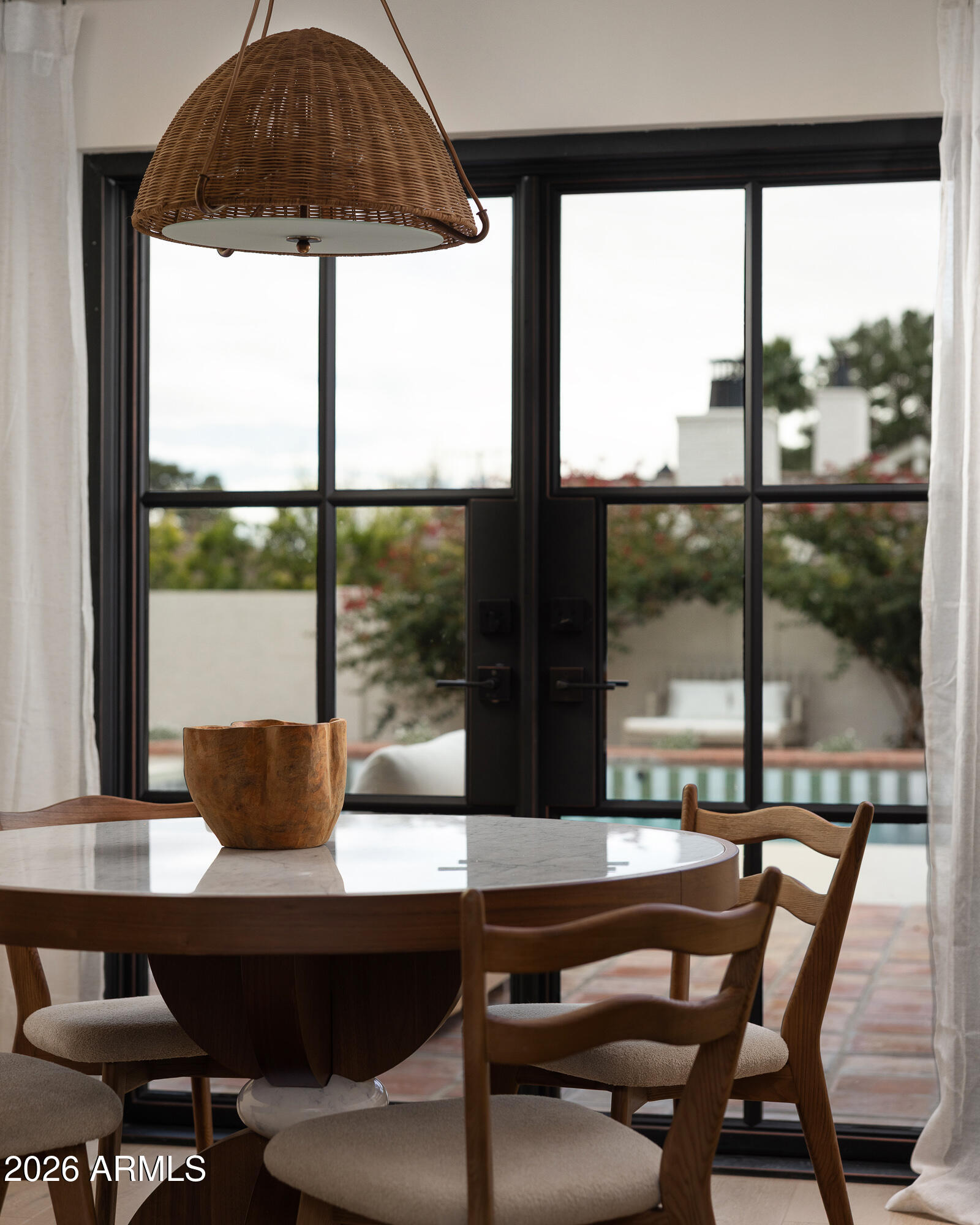 5501 East Camelback Road Phoenix, AZ 85018 - Photo 24 of 60 a outdoor view from a dining room with furniture