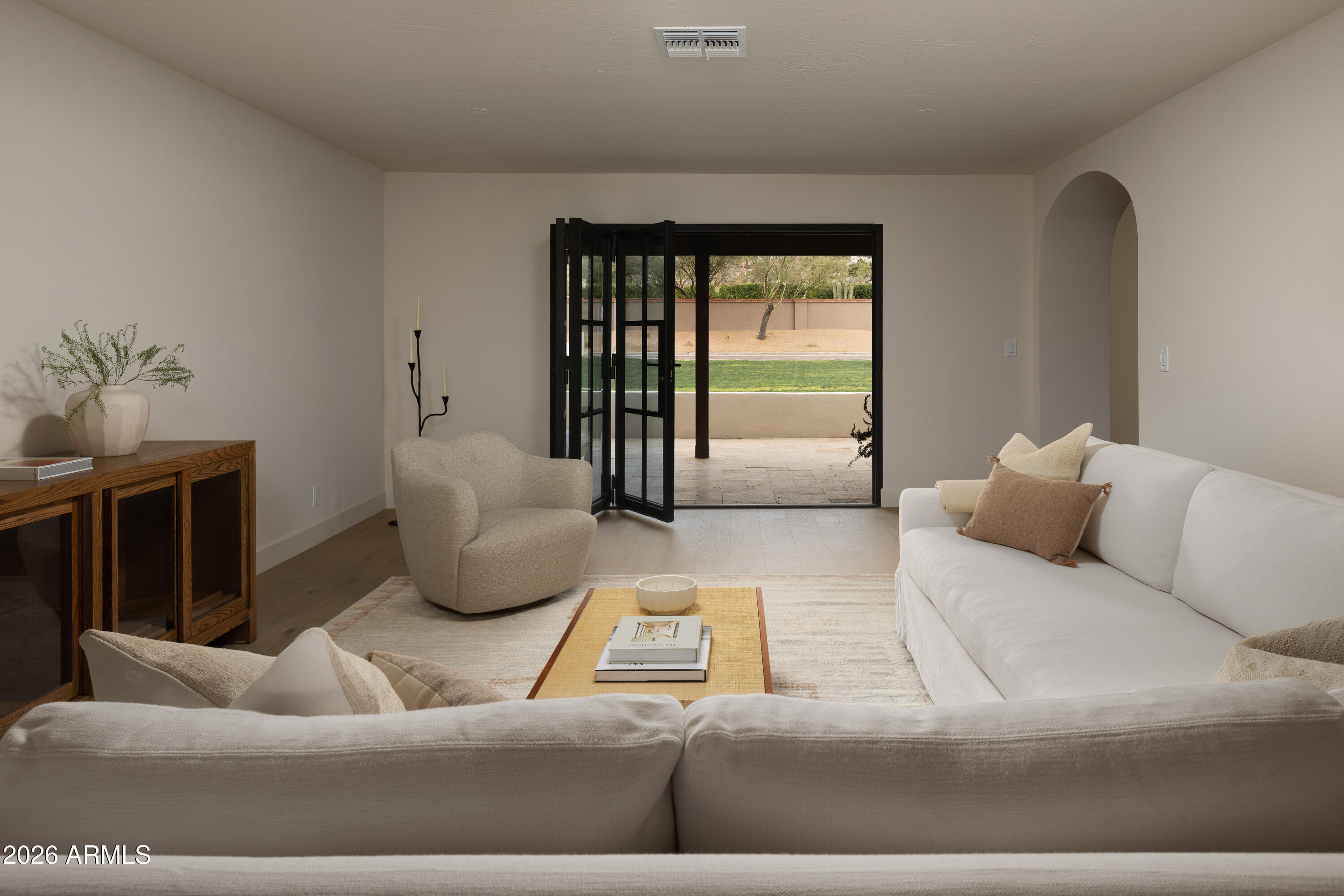 5501 East Camelback Road Phoenix, AZ 85018 - Photo 29 of 60 a living room with furniture and a window