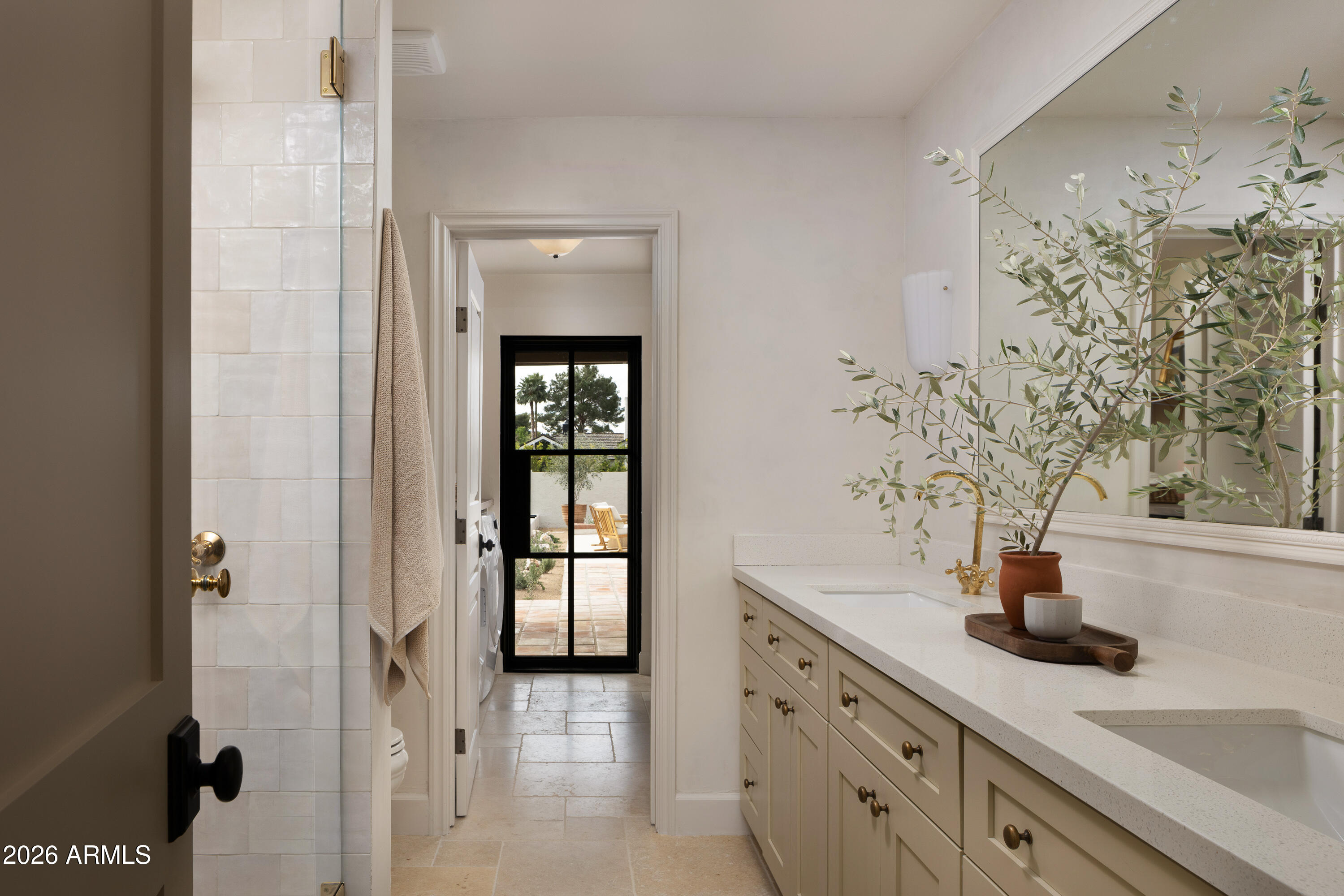 5501 East Camelback Road Phoenix, AZ 85018 - Photo 44 of 60 a kitchen with sink and cabinets
