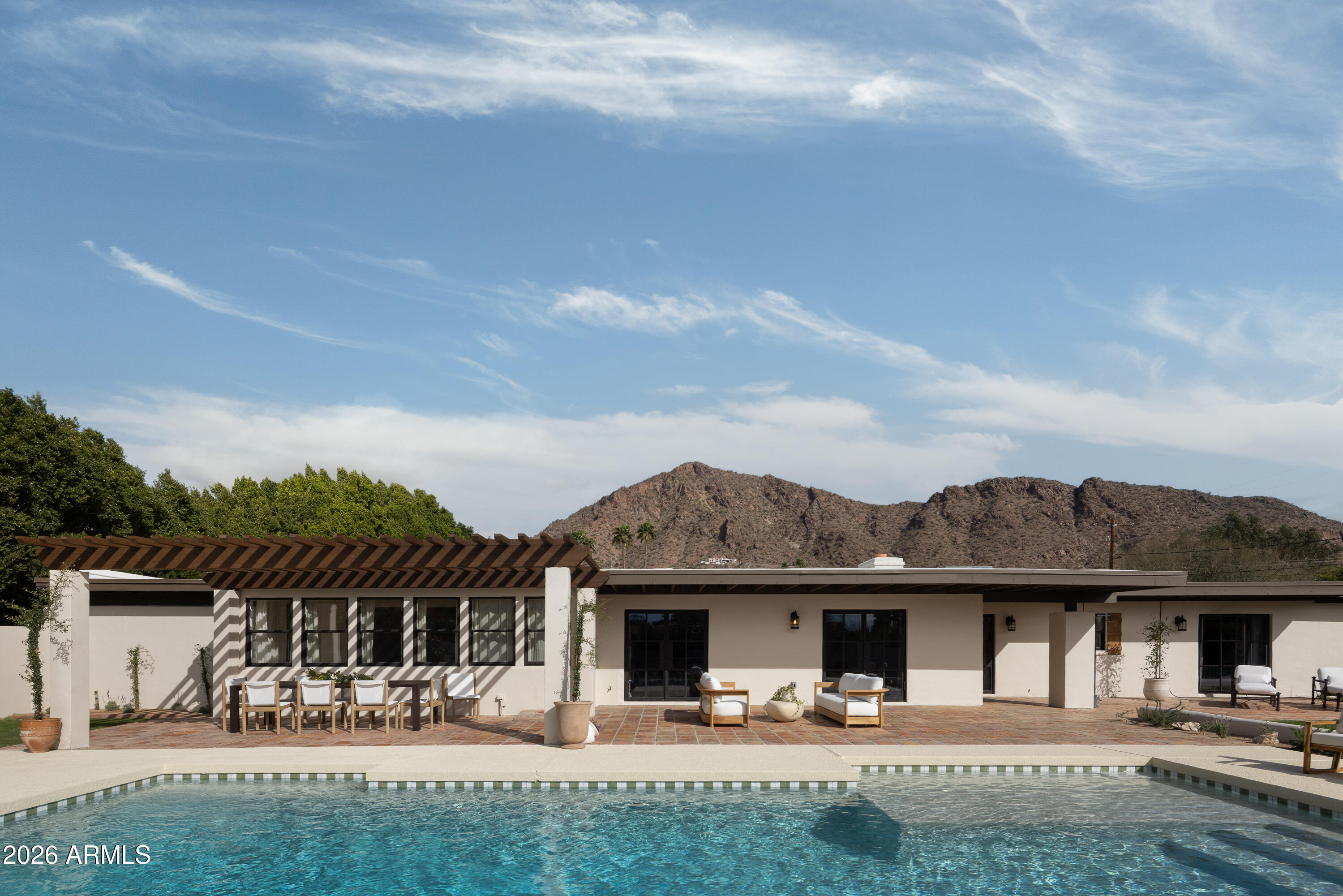 5501 East Camelback Road Phoenix, AZ 85018 - Photo 56 of 60 a front view of a house with a yard