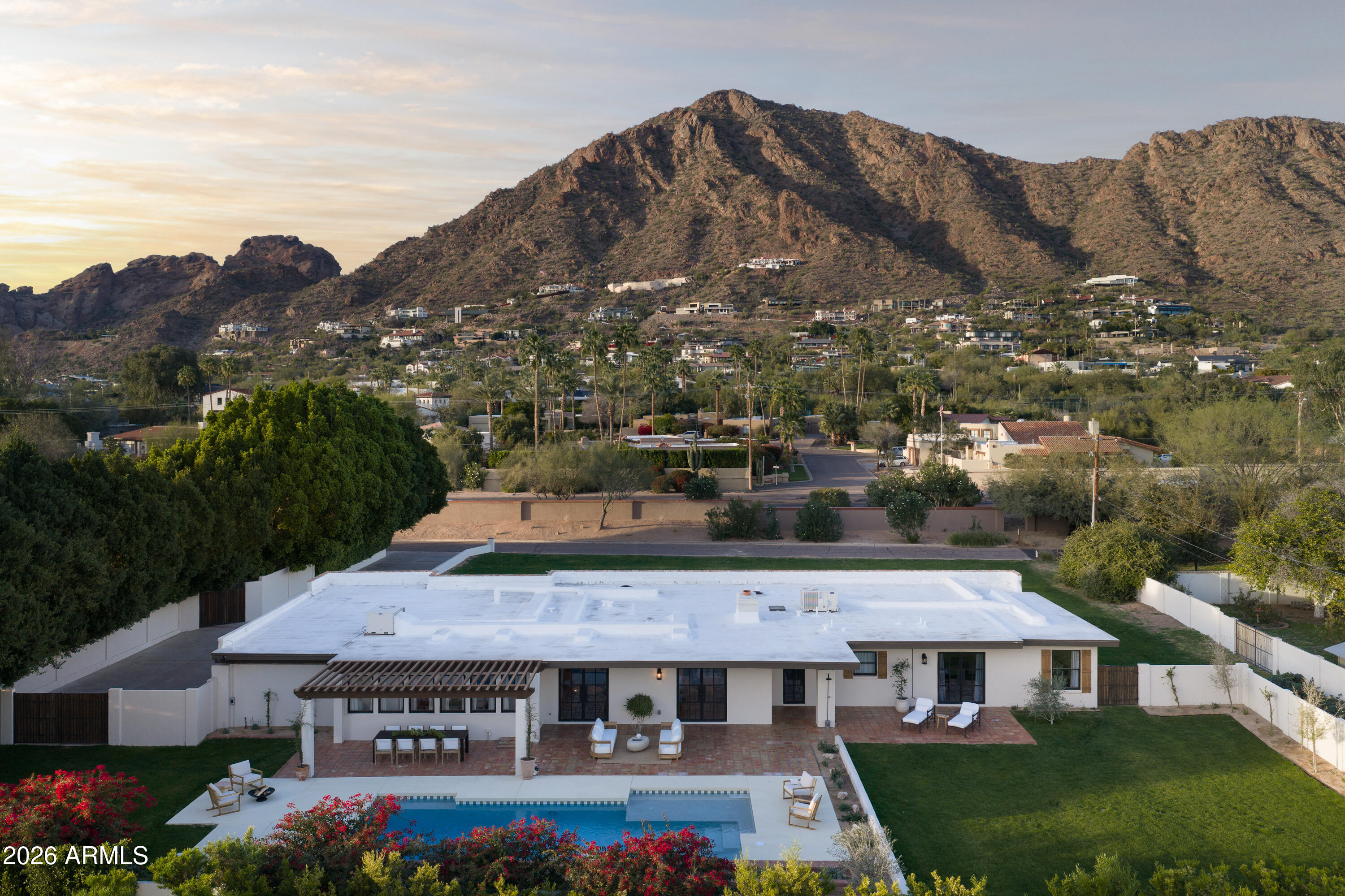 5501 East Camelback Road Phoenix, AZ 85018 - Photo 58 of 60 an aerial view of a house with a yard