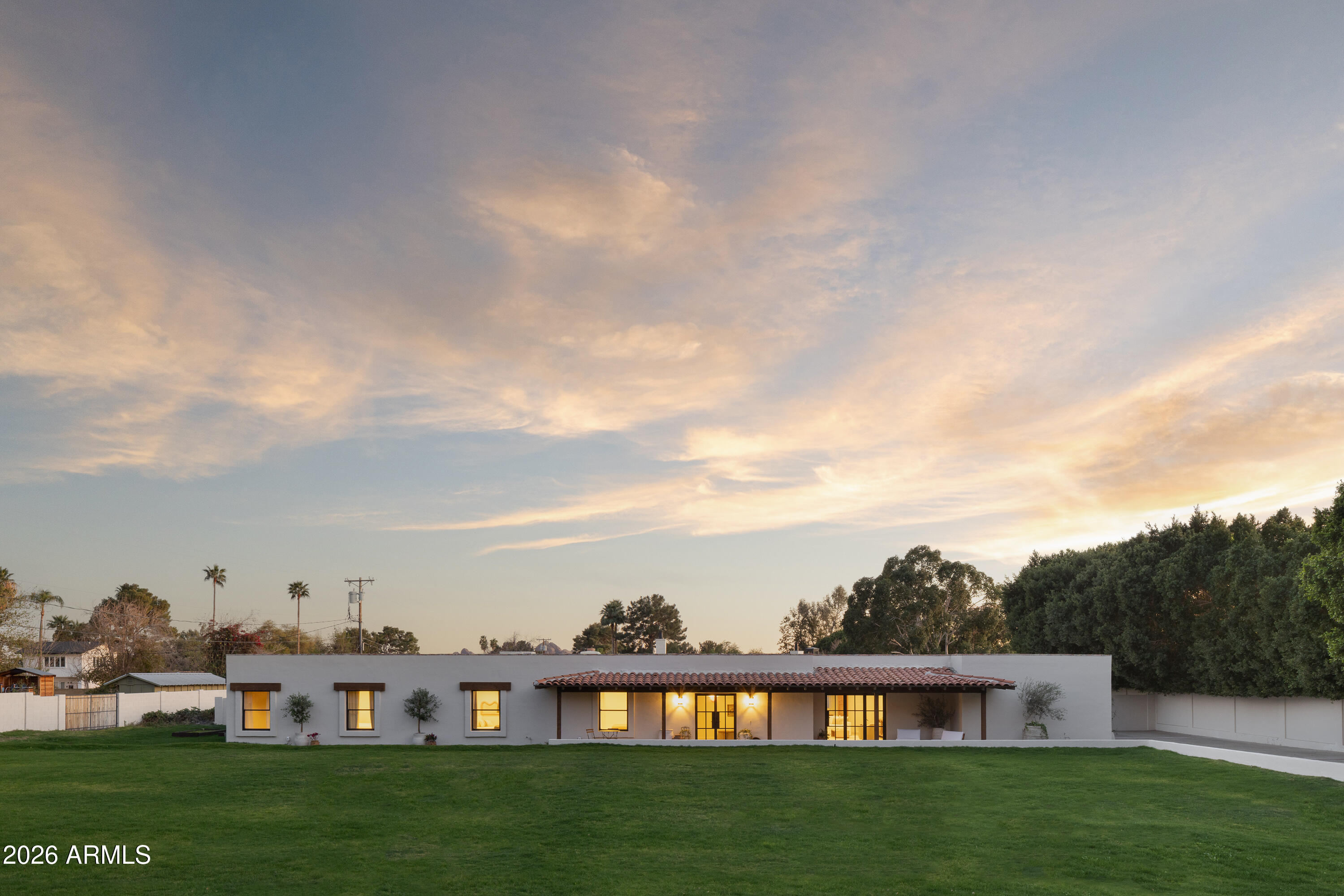 5501 East Camelback Road Phoenix, AZ 85018 - Photo 8 of 60 a view of a big yard with a large trees