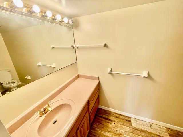 a bathroom with a tub and a shower