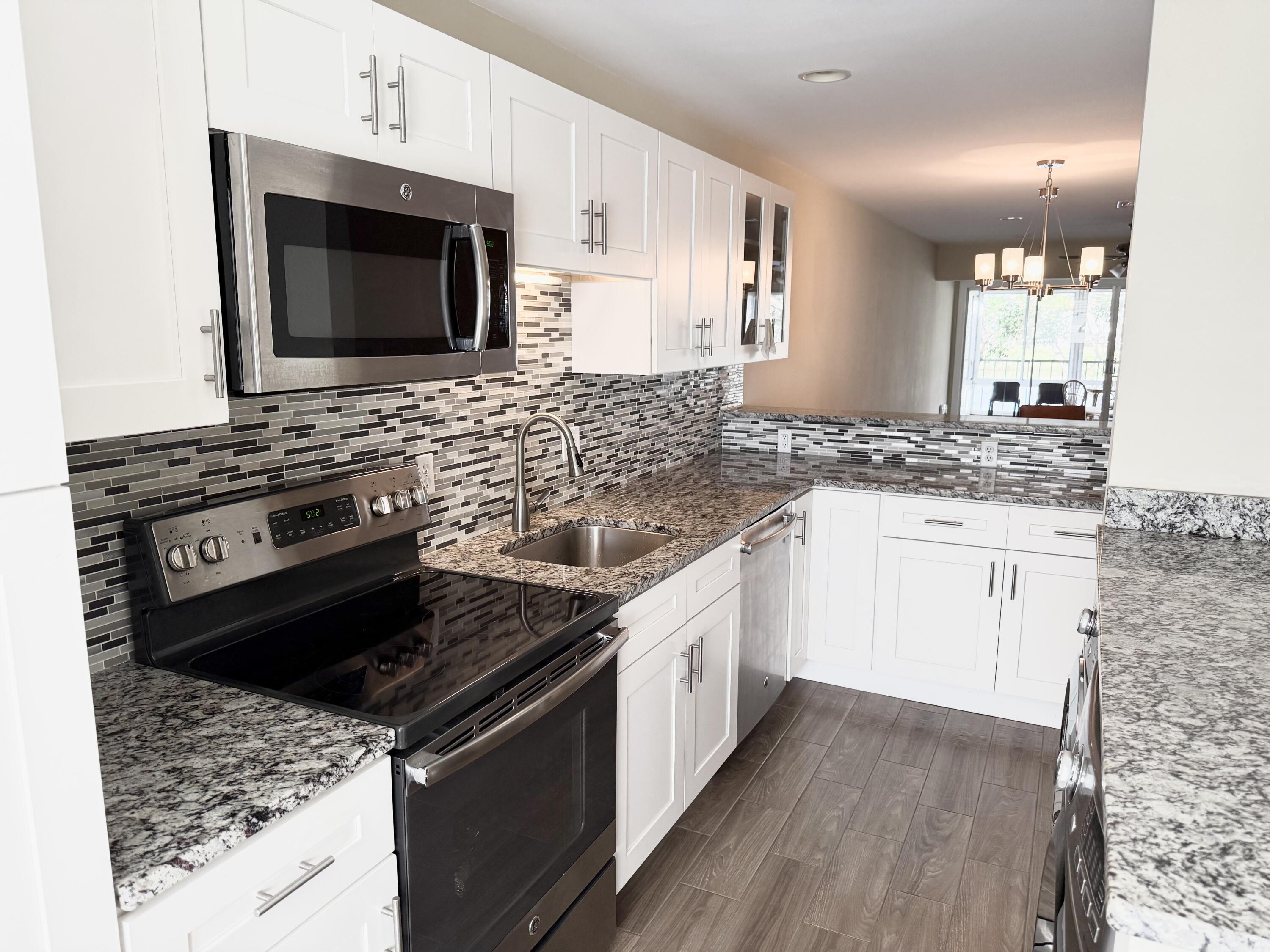 2811 Southwest 15th Street, Unit 202 Delray Beach, FL 33445 - Photo 3 of 35 Kitchen