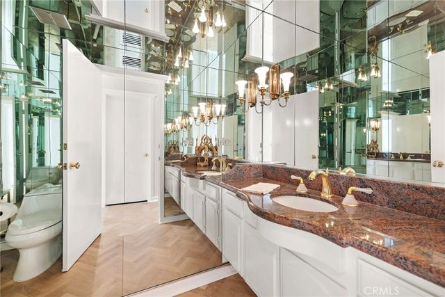 a bathroom with sink and mirror