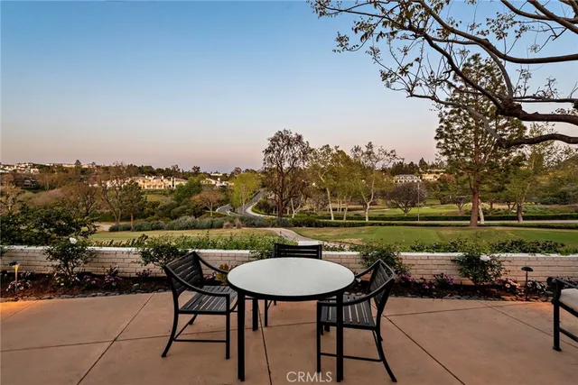 a view of a chairs and table on the terrace