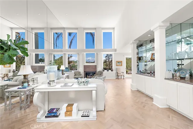 a view of a living room and kitchen
