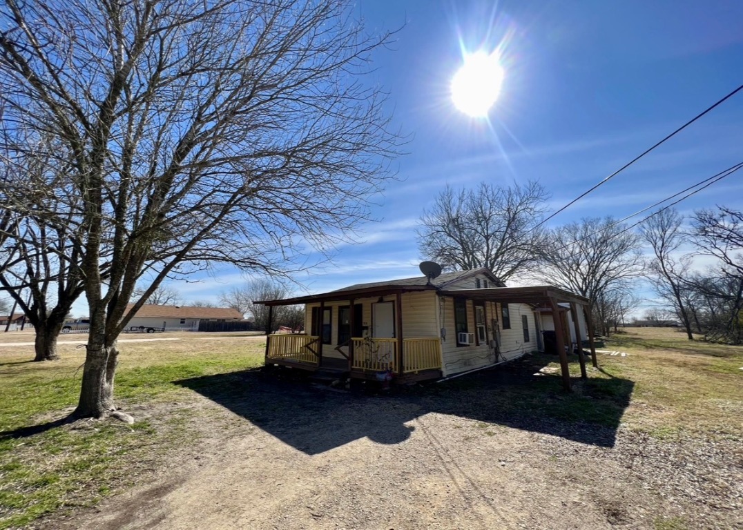 514 Ruddy Street, Unit A Lockhart, TX 78644 - Photo 2 of 9 a view of house with outdoor space