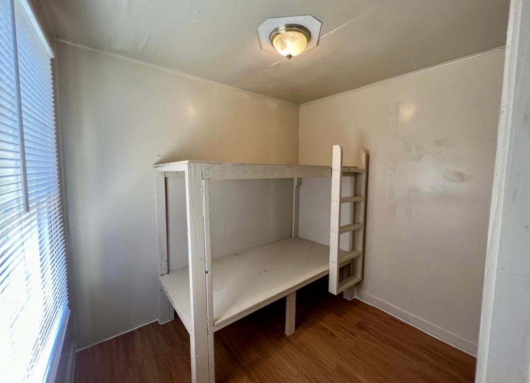 514 Ruddy Street, Unit A Lockhart, TX 78644 - Photo 9 of 9 a view of entryway with wooden floor