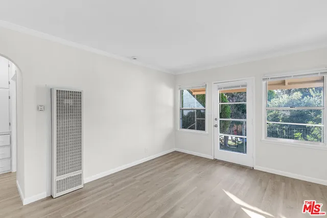 an empty room with windows