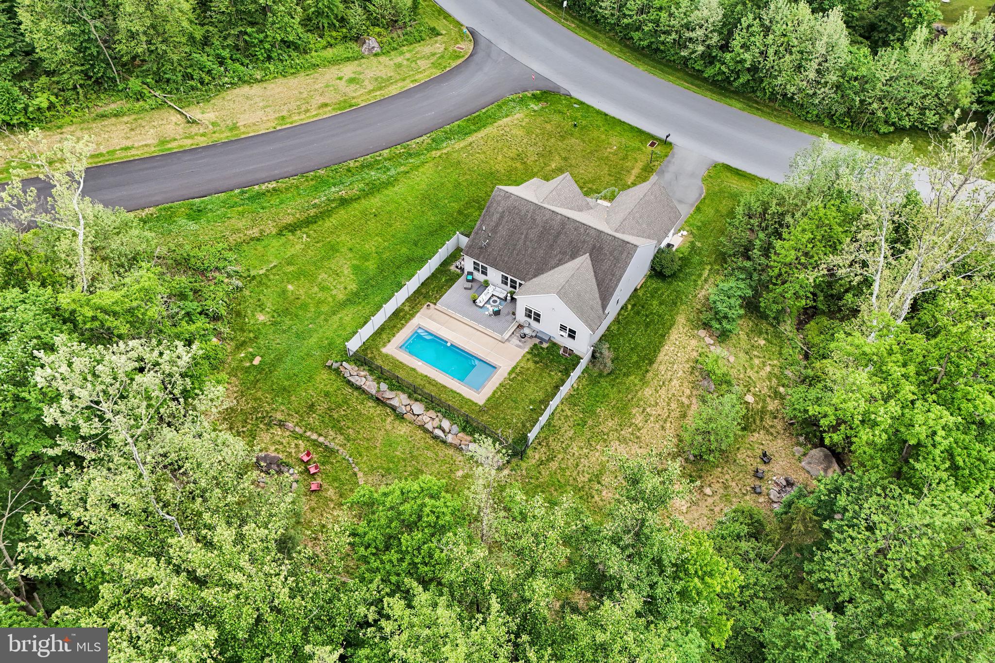 110 Freys Road Elizabethtown, PA 17022 - Photo 38 of 47 Serene retreat with pool and greenery.