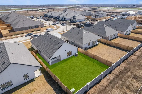 an aerial view of a tennis ground