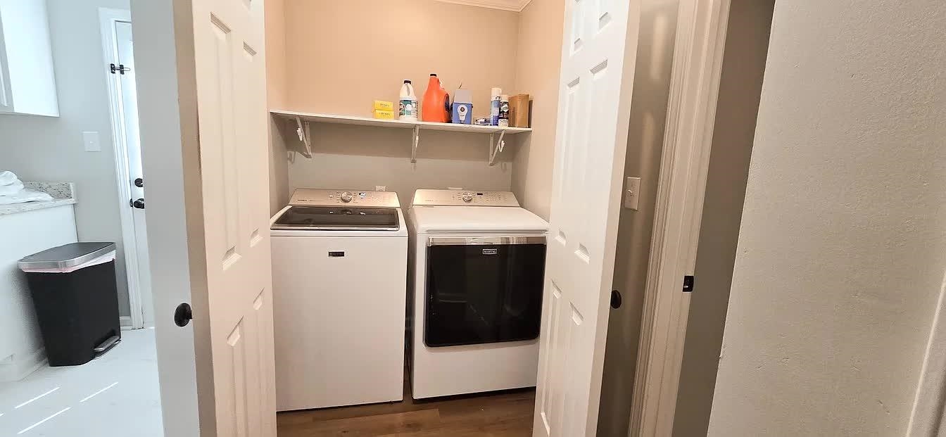 15 South Cox Street Memphis, TN 38104 - Photo 16 of 20 a utility room with dryer and washer