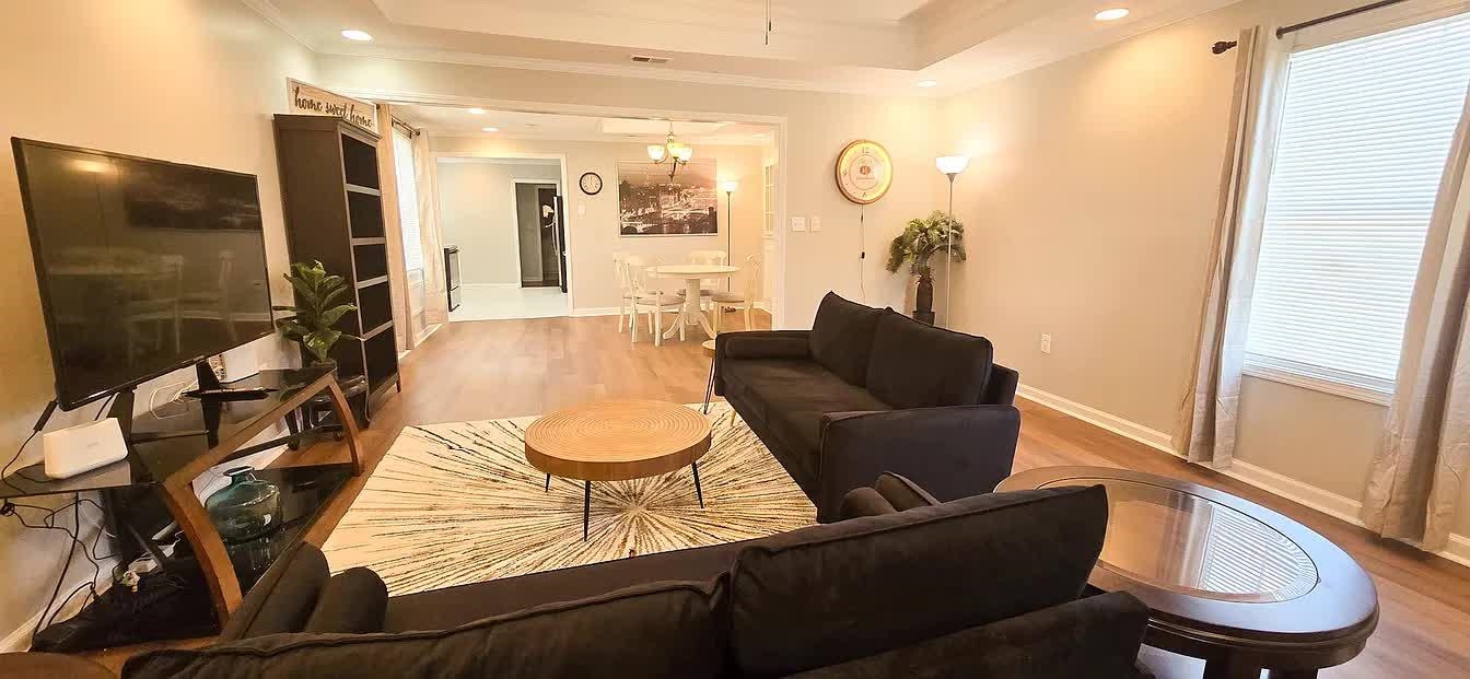 15 South Cox Street Memphis, TN 38104 - Photo 19 of 20 a living room with furniture and a flat screen tv