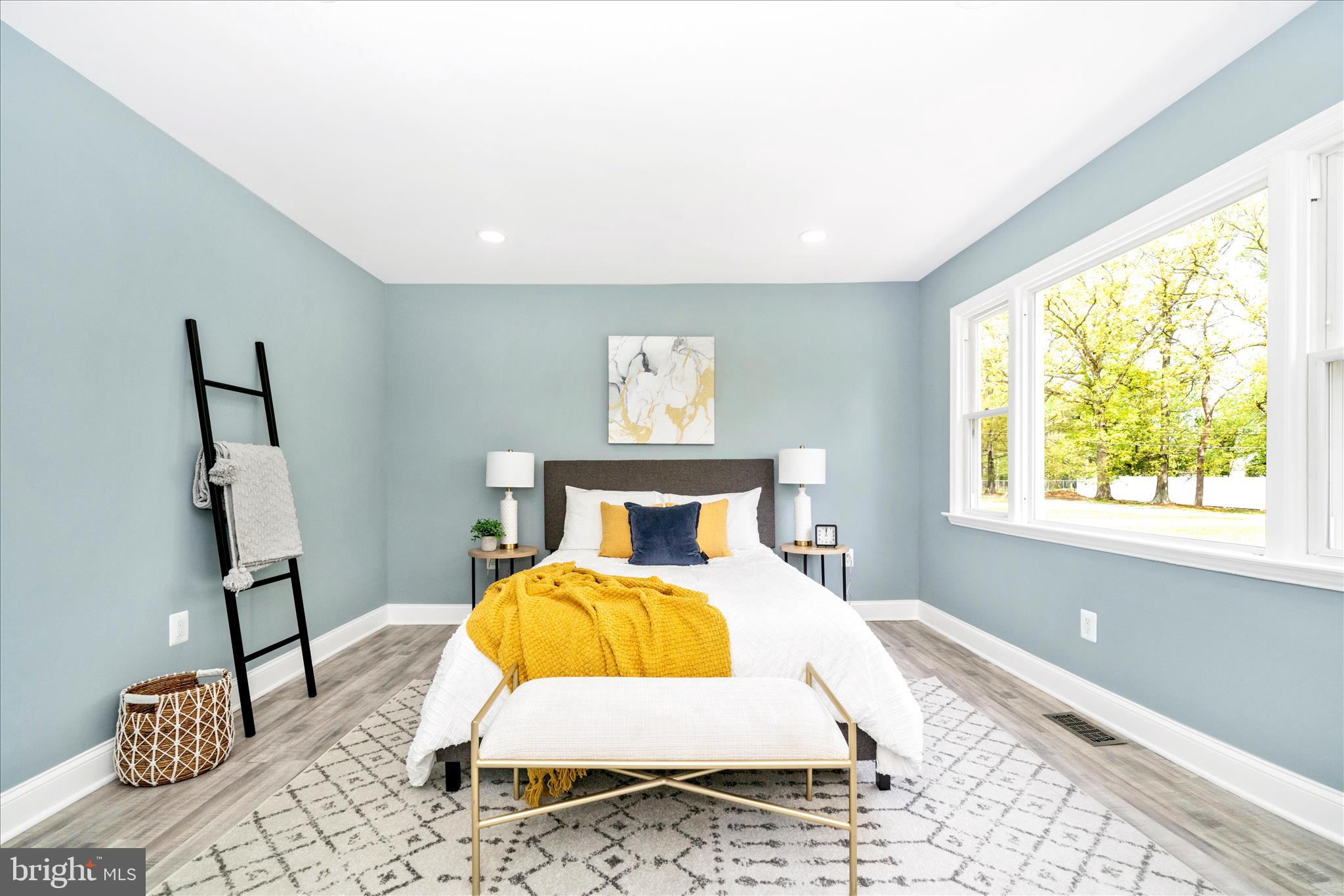 6737 Allentown Road Temple Hills, MD 20748 - Photo 34 of 51 a bedroom with a bed and a window