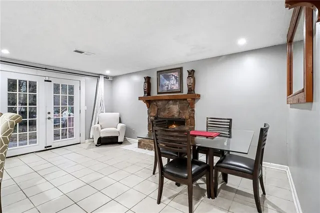 a bedroom with furniture and a baby crib