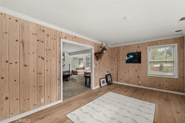 a bedroom with a bed and furniture