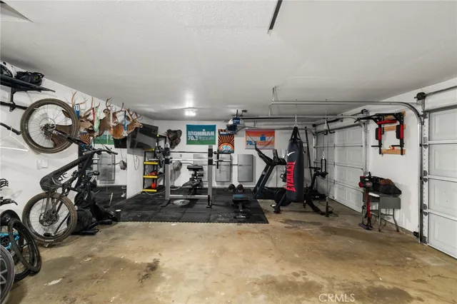 a view of a tables and chairs in back yard of the house