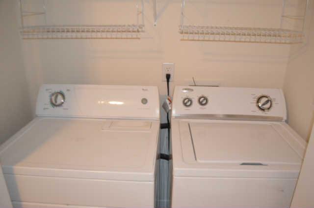 3535 Bell Road, Unit 906 Nashville, TN 37214 - Photo 14 of 19 Laundry room is located upstairs and includes the shown Whirlpool washer and dryer.
