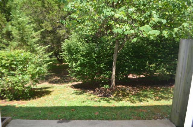 3535 Bell Road, Unit 906 Nashville, TN 37214 - Photo 15 of 19 Veiw from the dining/kitchen area is one of privacy with beautiful mature trees.