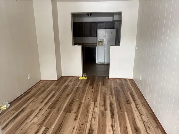 a view of a bedroom from stairs