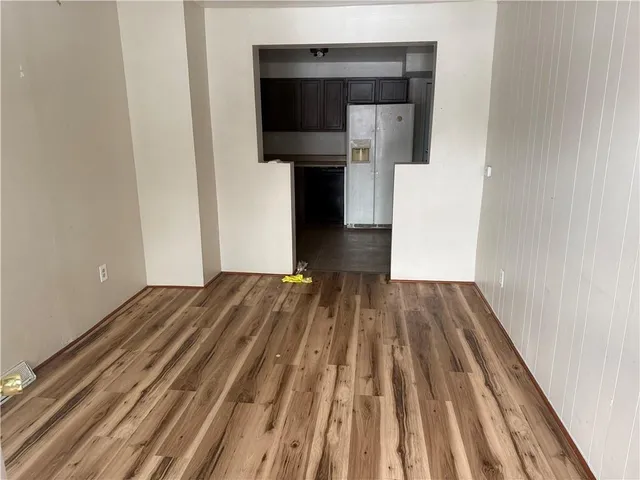 a view of a bedroom from stairs