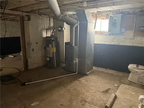 a bathroom with a shower and a sink