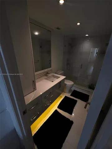 a bathroom with a sink and a toilet