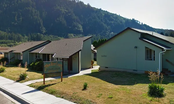 a house view with a garden space