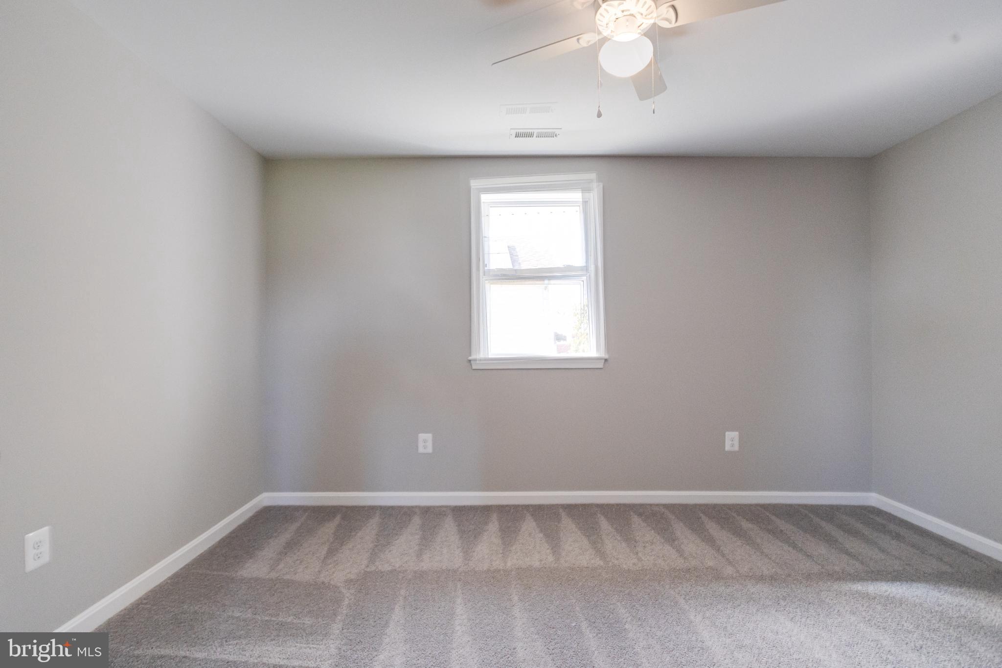 7540 Bay Front Road Sparrows Point, MD 21219 - Photo 54 of 63 an empty room with a window